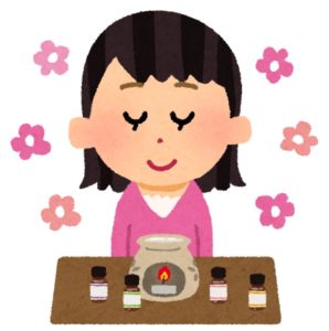 アロマオイルを嗅ぐ